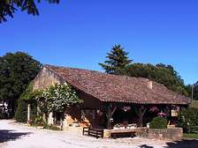 Grange bar-salon du Domaine de Gavaudun village de vacances en gîtes en Périgord-Dordogne et Quercy
